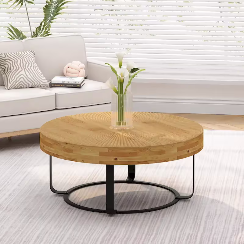 Contemporary Round Wooden Coffee Table with Intricate Carving and Metal Legs